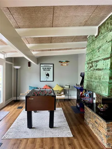 a living room with furniture and a table