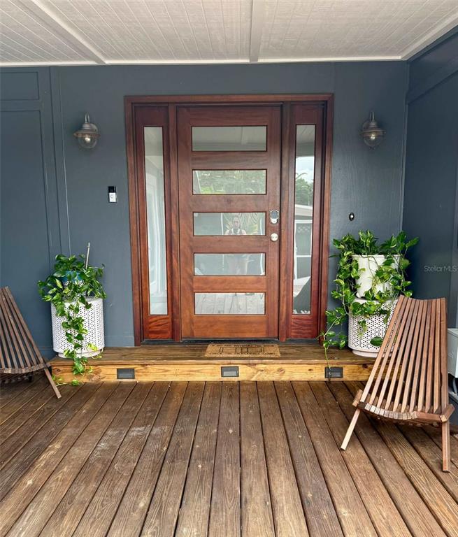 3012 Grand View Avenue Clearwater, FL 33759 - Photo 4 of 43 a view of outdoor space with deck and patio