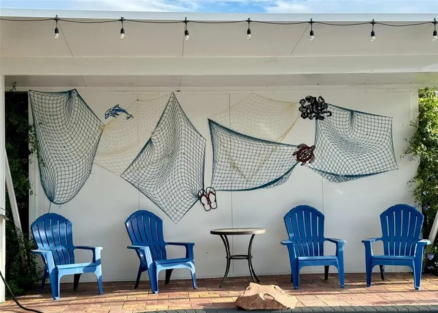 a kitchen with a table chairs and a stove
