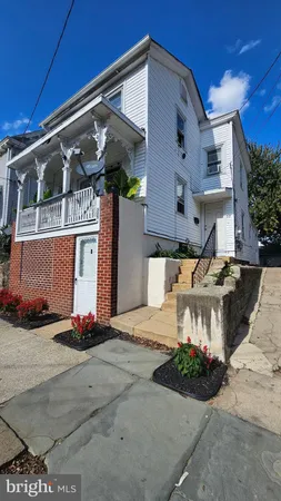 a front view of a house with porch
