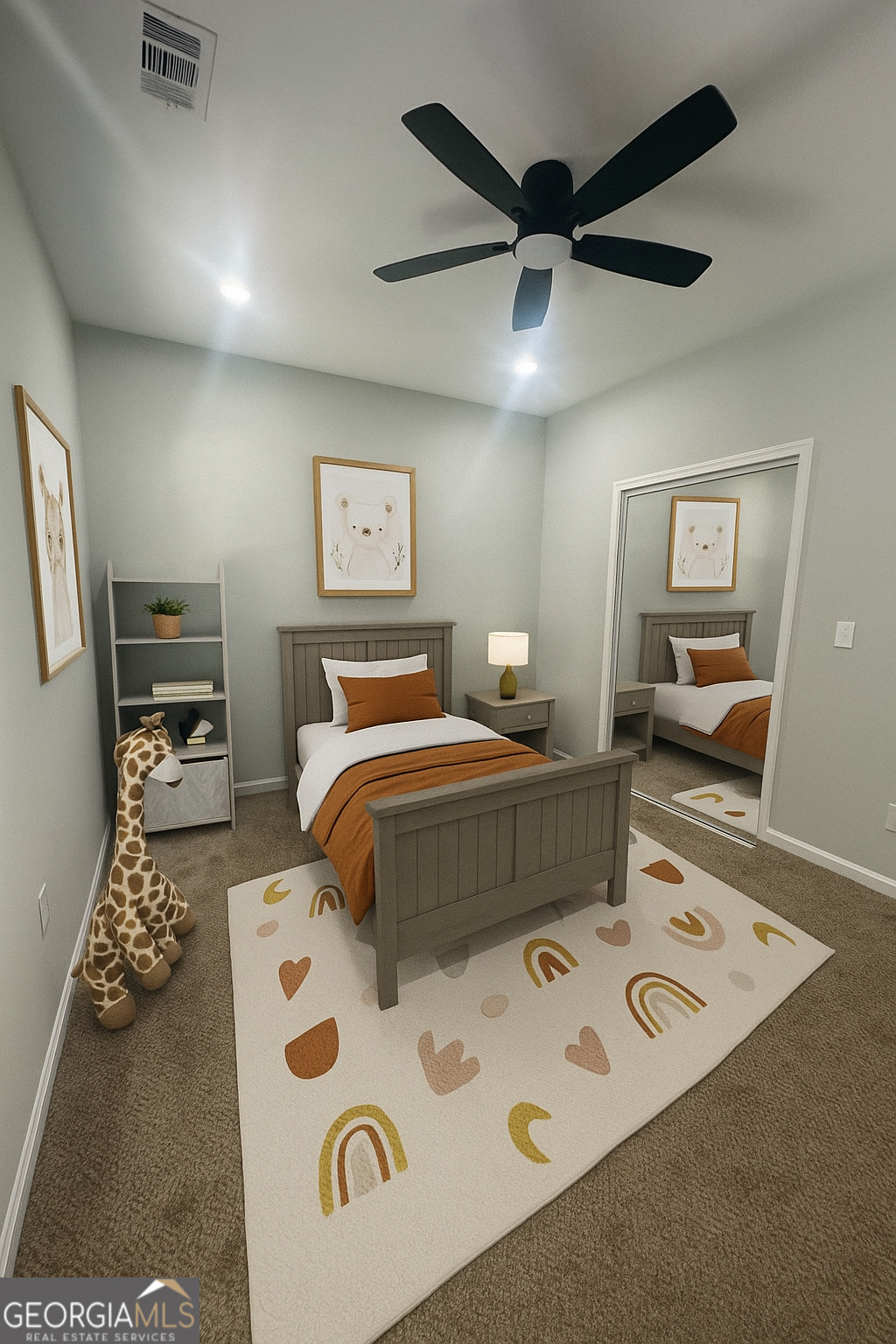 119 F Street Thomaston, GA 30286 - Photo 10 of 27 a bedroom with a bed and a table in it