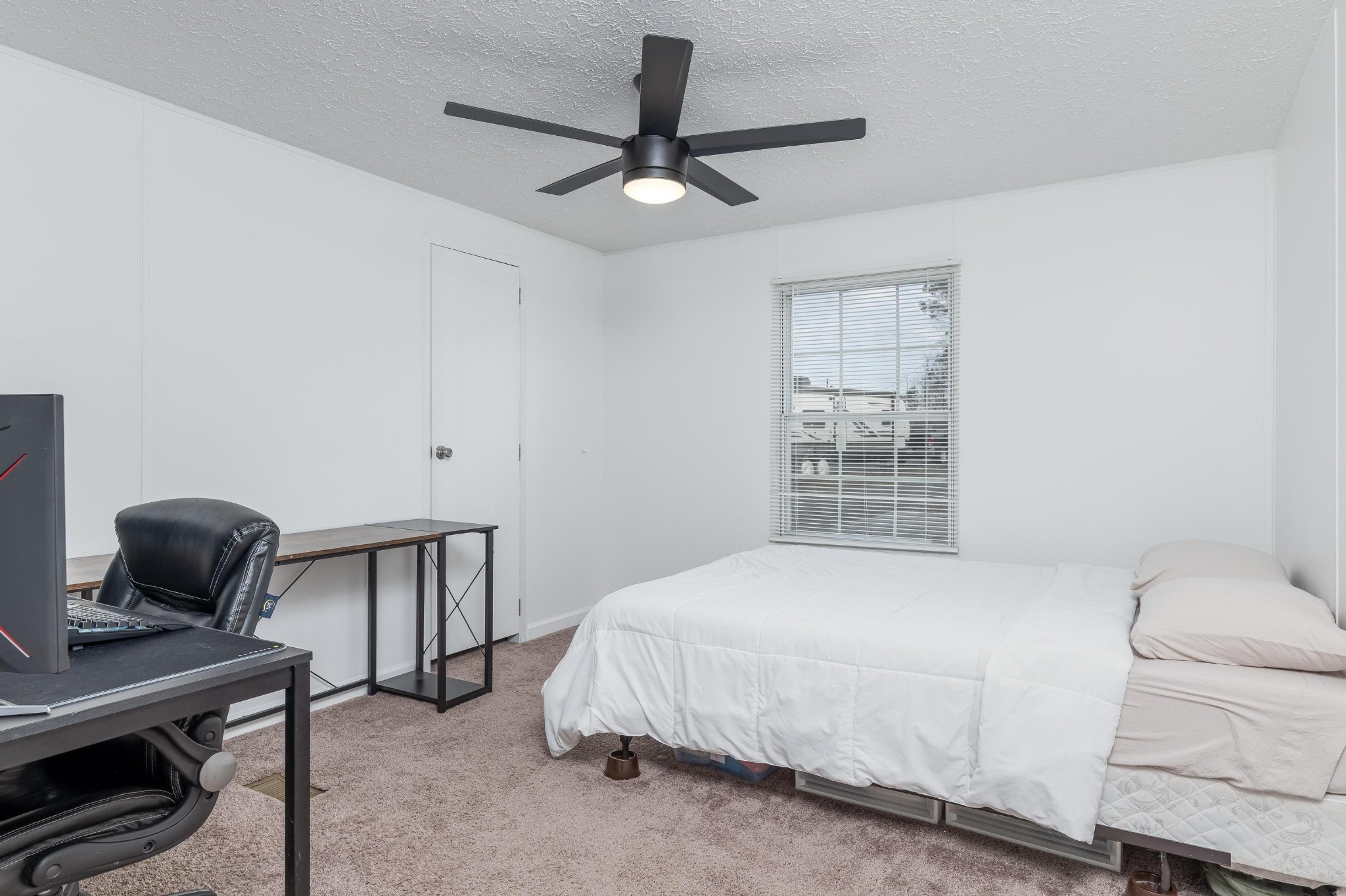 720 Armstrong Road Southeast Cleveland, TN 37323 - Photo 10 of 16 a bedroom with a bed and a window