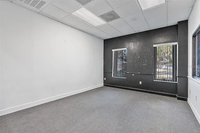 an empty room with windows