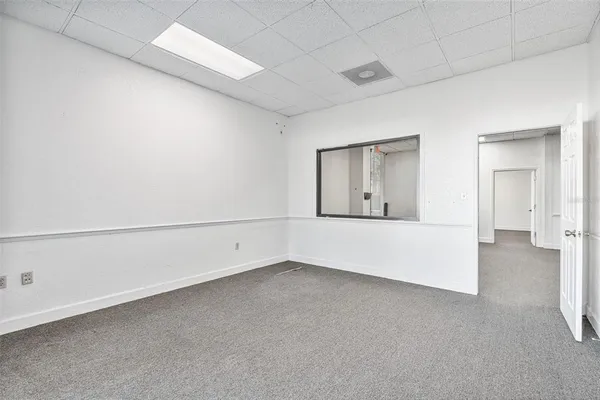 an empty room with cabinet