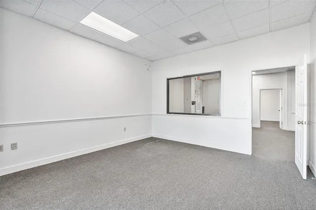 an empty room with cabinet