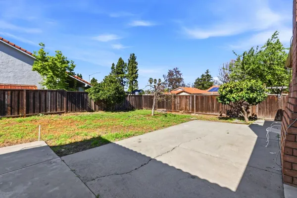 a swimming pool with wooden fence