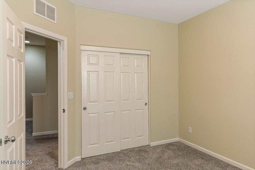 1864 Wind Ranch Road, Unit B Reno, NV 89521 - Photo 27 of 42 a view of an empty room