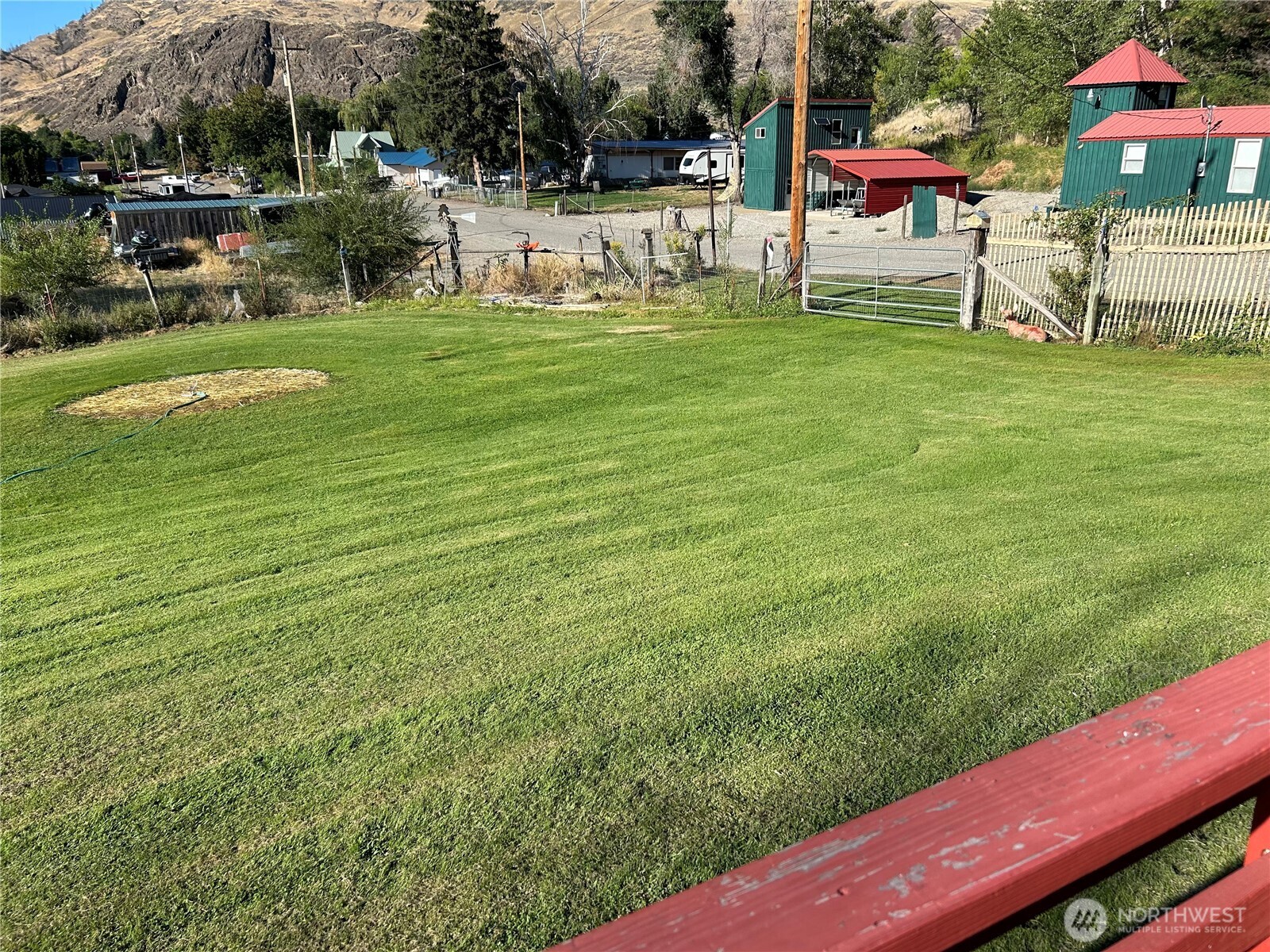 34 Main Street Loomis, WA 98827 - Photo 2 of 18 a view of a bench in the garden
