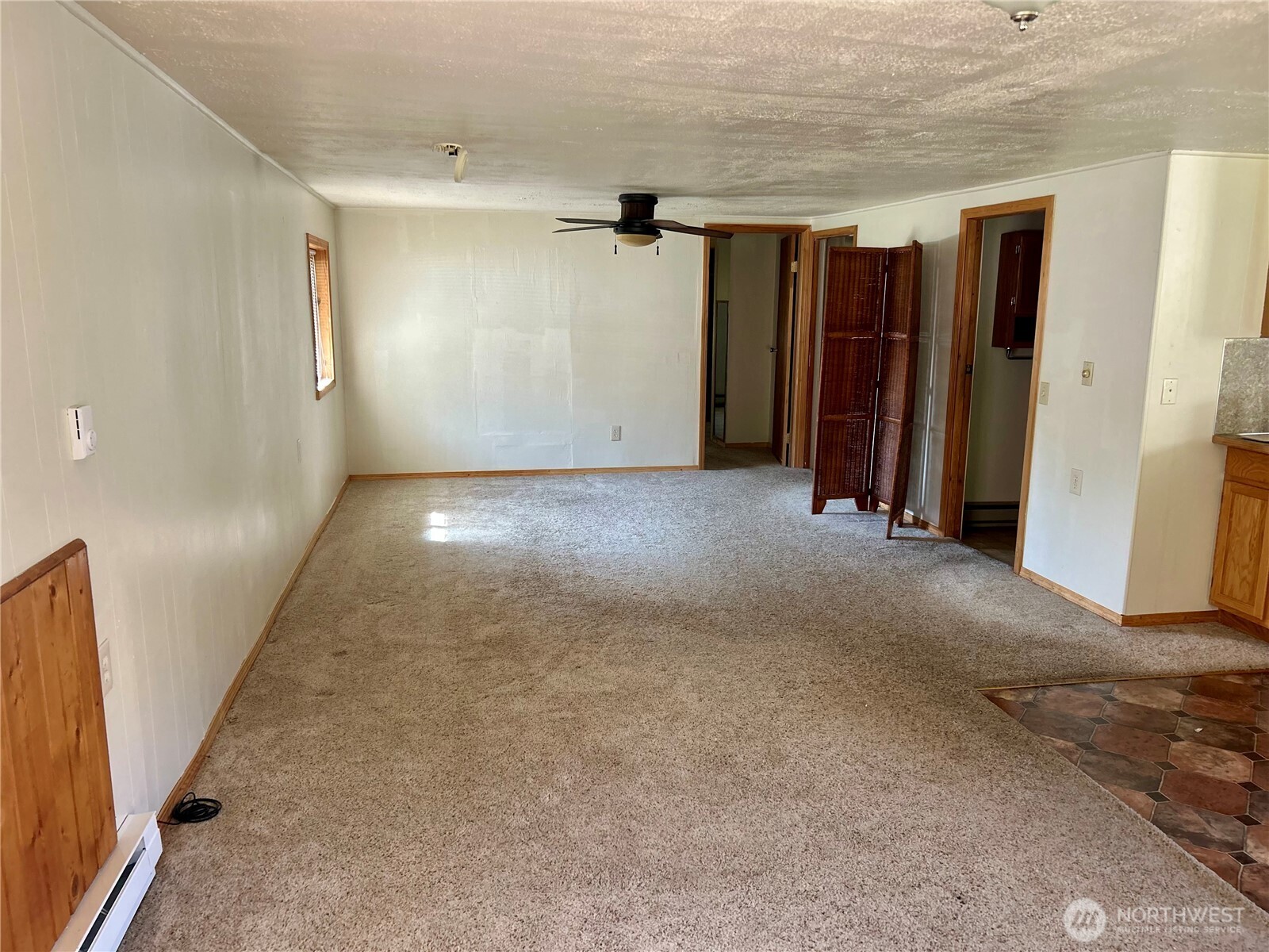 34 Main Street Loomis, WA 98827 - Photo 8 of 18 an empty room with a walk in closet