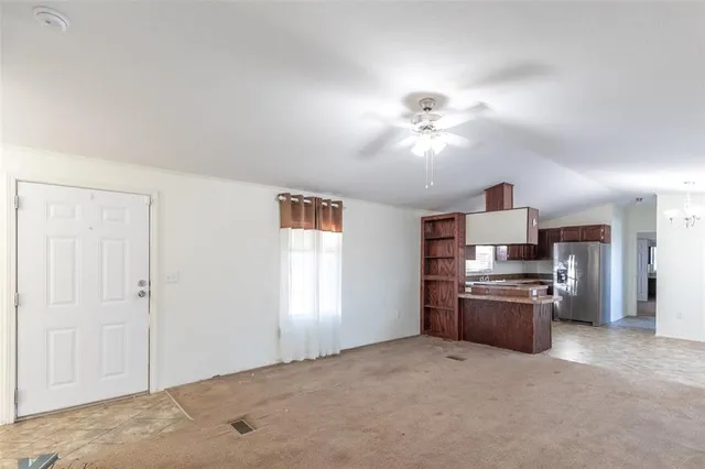 a view of kitchen and microwave
