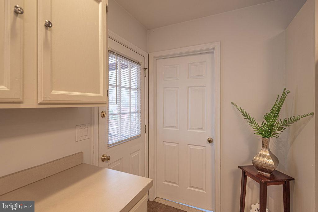 32 Gloucester Road Ocean Pines, MD 21811 - Photo 19 of 32 kitchen-door to laundry & door to screen porch