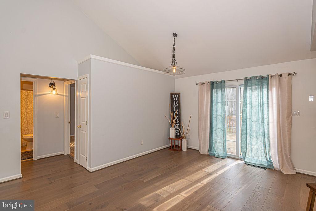 32 Gloucester Road Ocean Pines, MD 21811 - Photo 5 of 32 Living room w/ sliders to deck