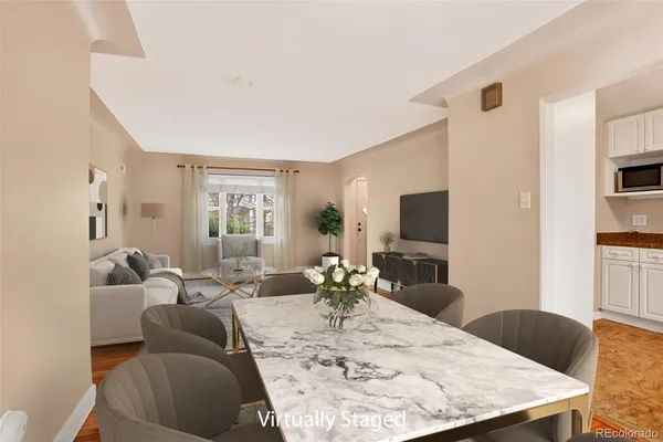 a living room with furniture or couch and a flat screen tv