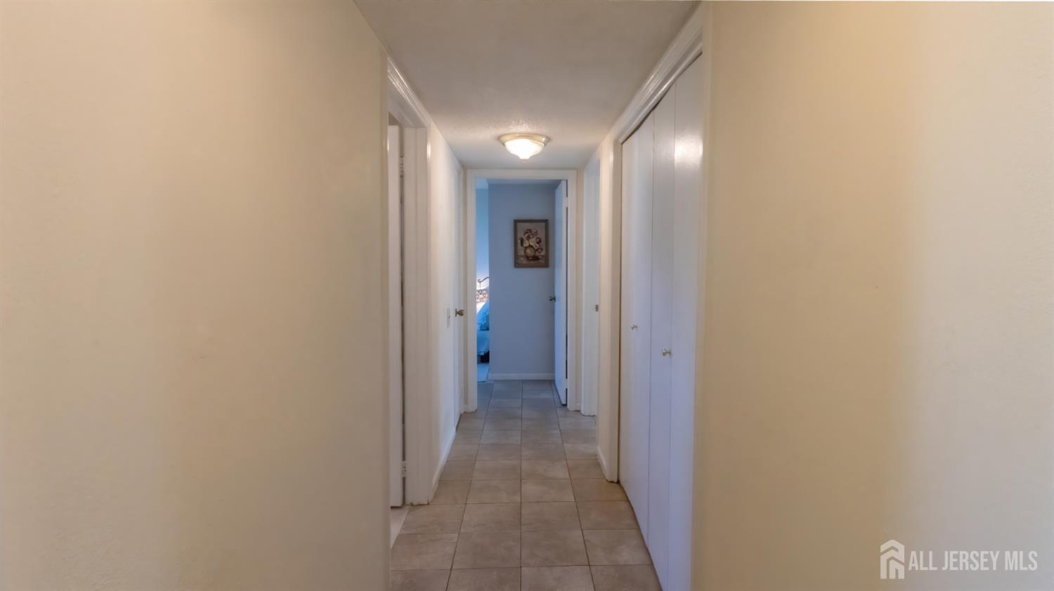 320 Sharon Way, Unit B Monroe Township, NJ 08831 - Photo 19 of 35 a view of hallway with a bathroom