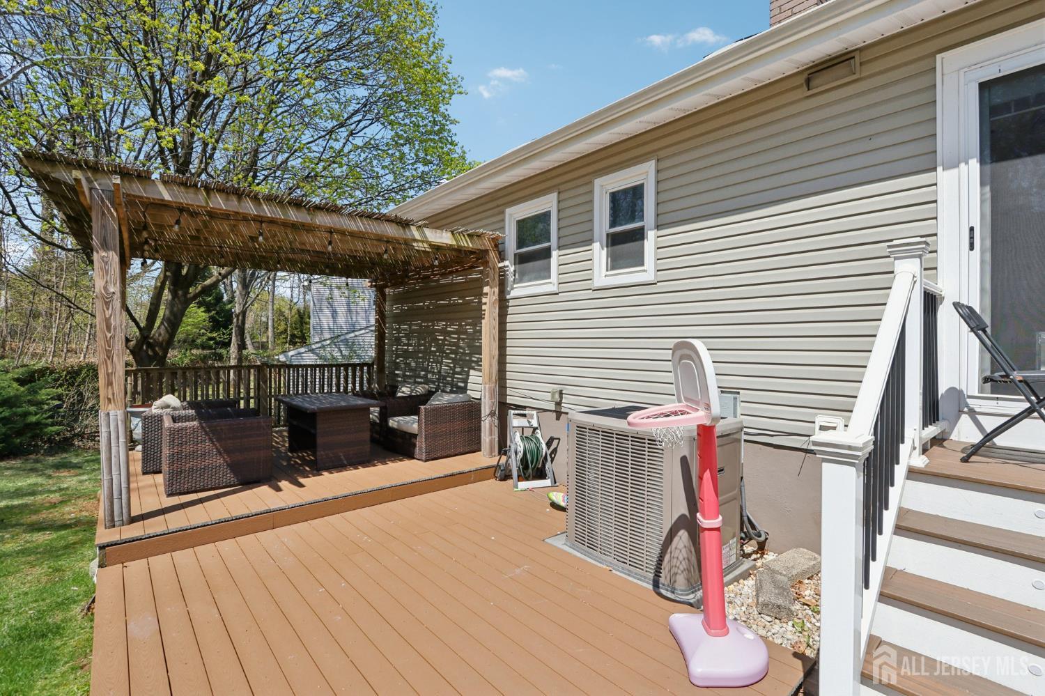 37 Merker Drive Edison, NJ 08837 - Photo 20 of 31 a view of a two chairs in the balcony