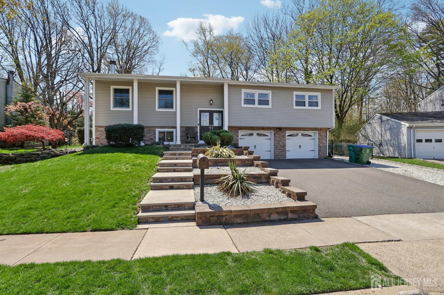37 Merker Drive Edison, NJ 08837 - Photo 2 of 31 a view of a house with a yard and sitting area