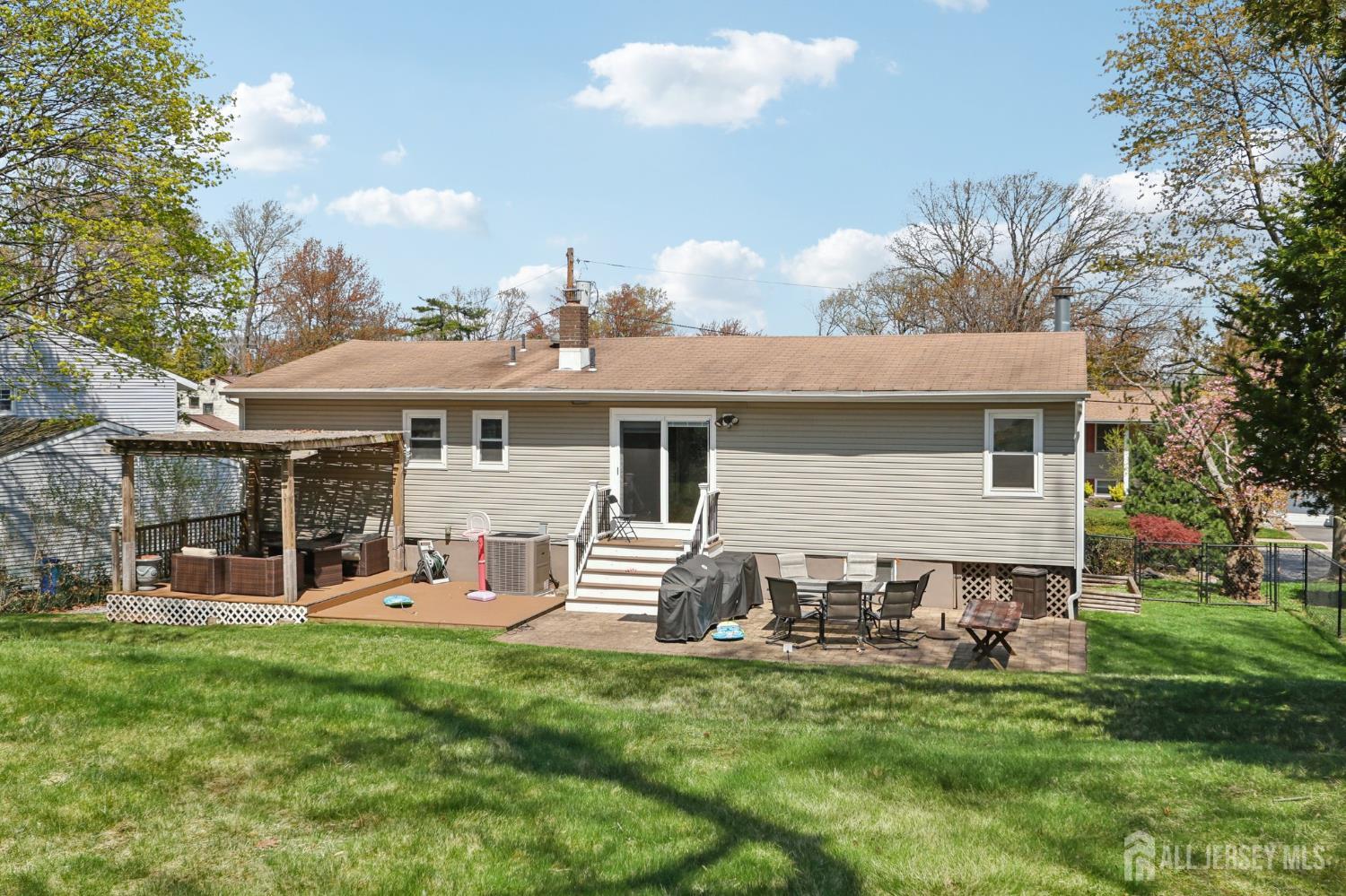 37 Merker Drive Edison, NJ 08837 - Photo 26 of 31 a view of a house with a yard porch and sitting area