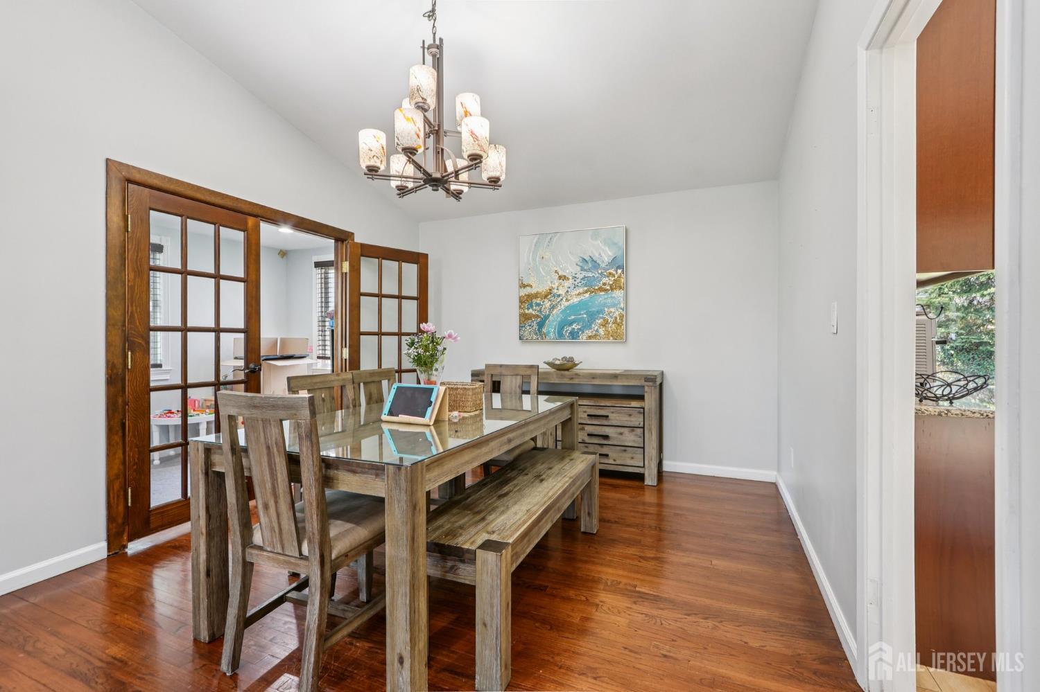 37 Merker Drive Edison, NJ 08837 - Photo 6 of 31 a view of a dining room with furniture wooden floor and chandelier