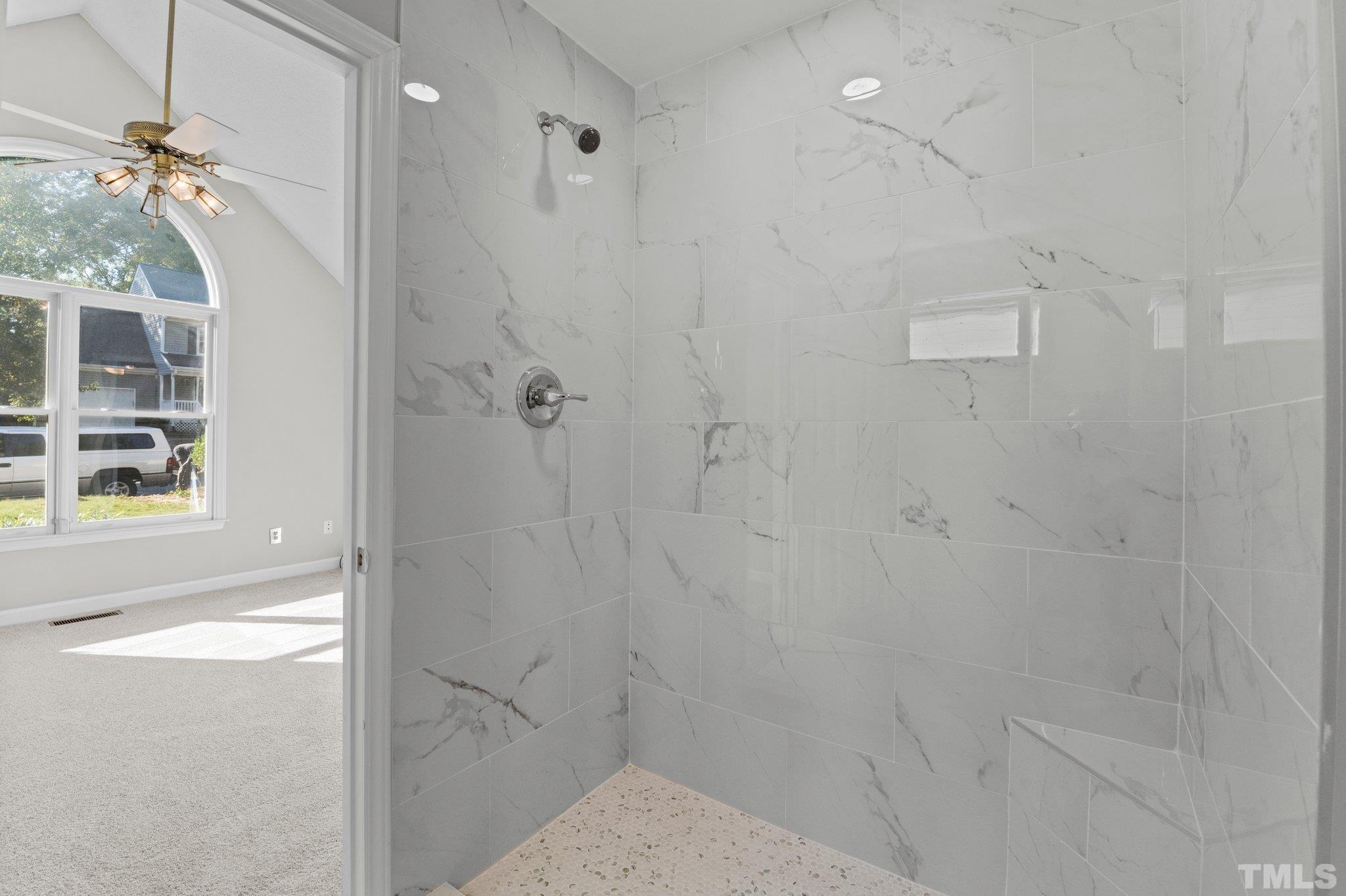4405 Birmingham Way Raleigh, NC 27604 - Photo 6 of 22 a bathroom with a shower