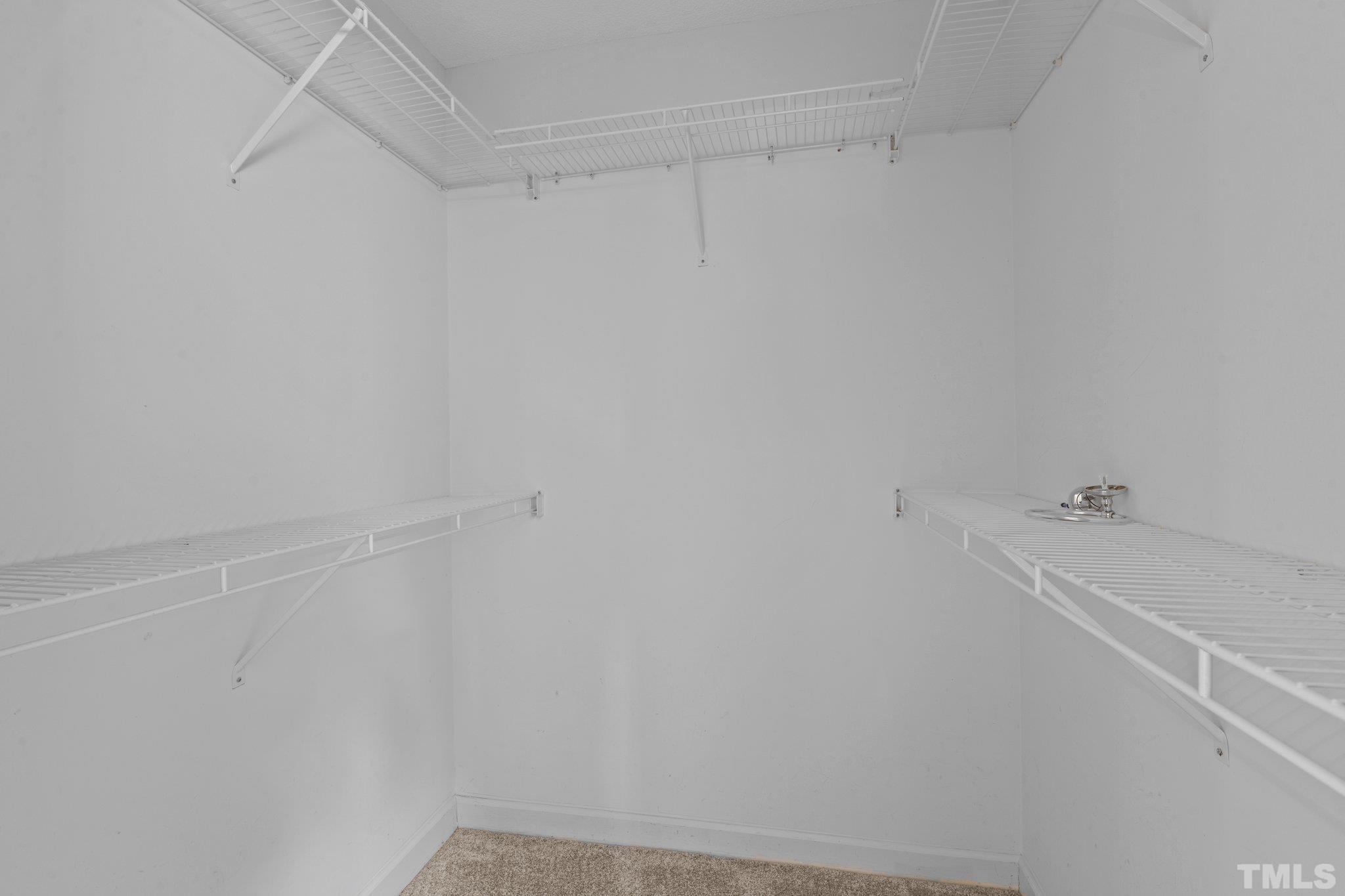 4405 Birmingham Way Raleigh, NC 27604 - Photo 7 of 22 a view of an empty walk in closet