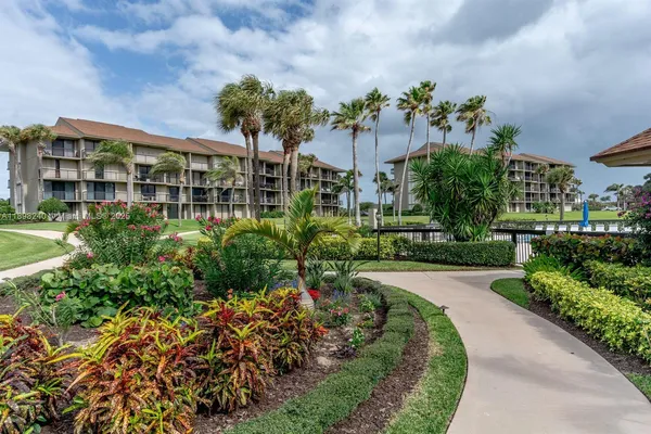 a view of a lake with a big yard
