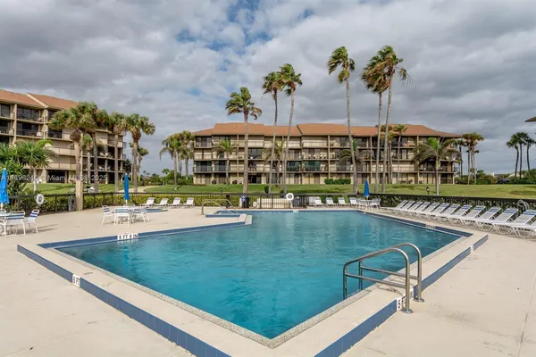 a view of a building with a swimming pool