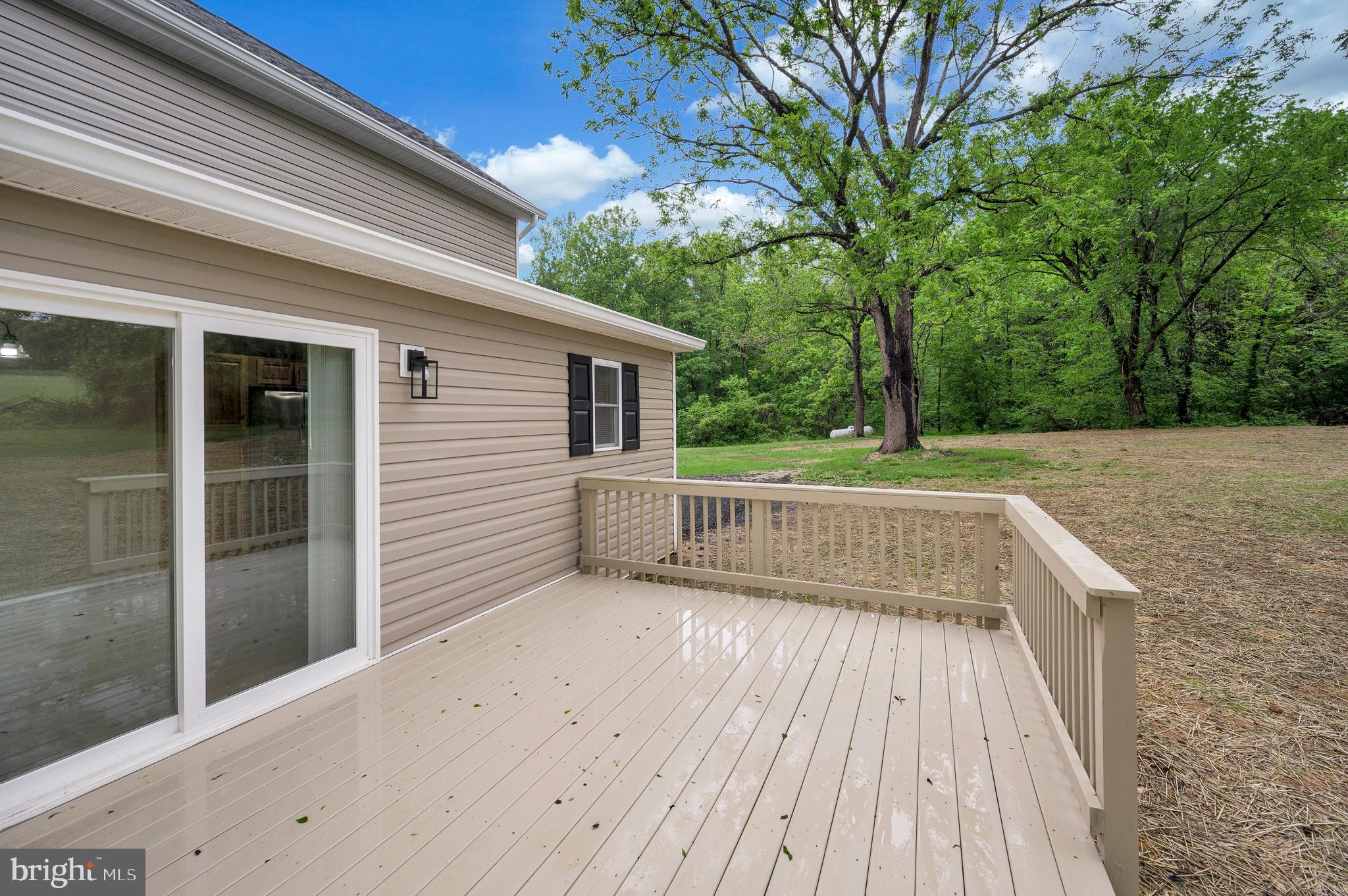14169 Silver Hill Road Sumerduck, VA 22742 - Photo 39 of 40 a view of outdoor space with deck and yard
