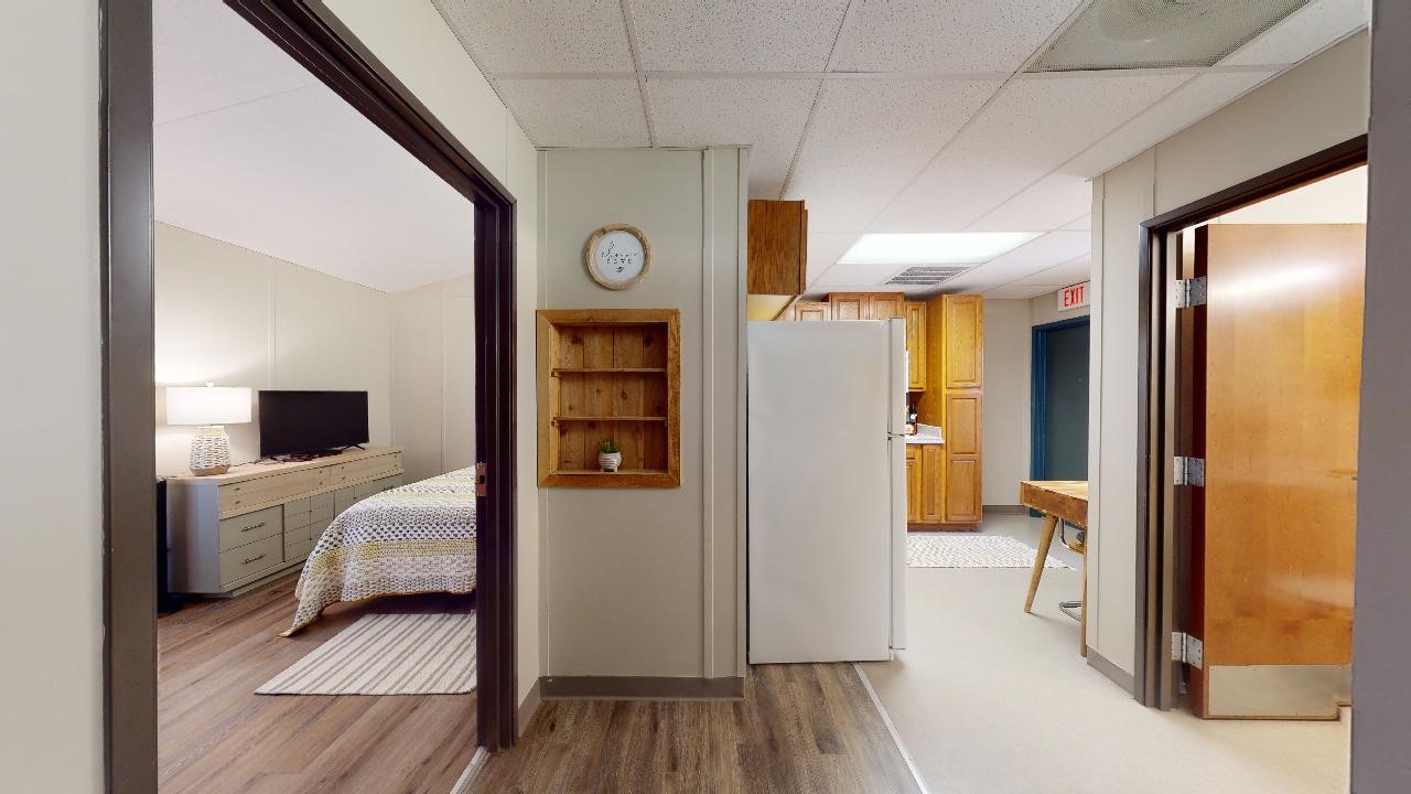 5585 Straub Road College Station, TX 77845 - Photo 11 of 50 a bedroom with a bed and a mirror