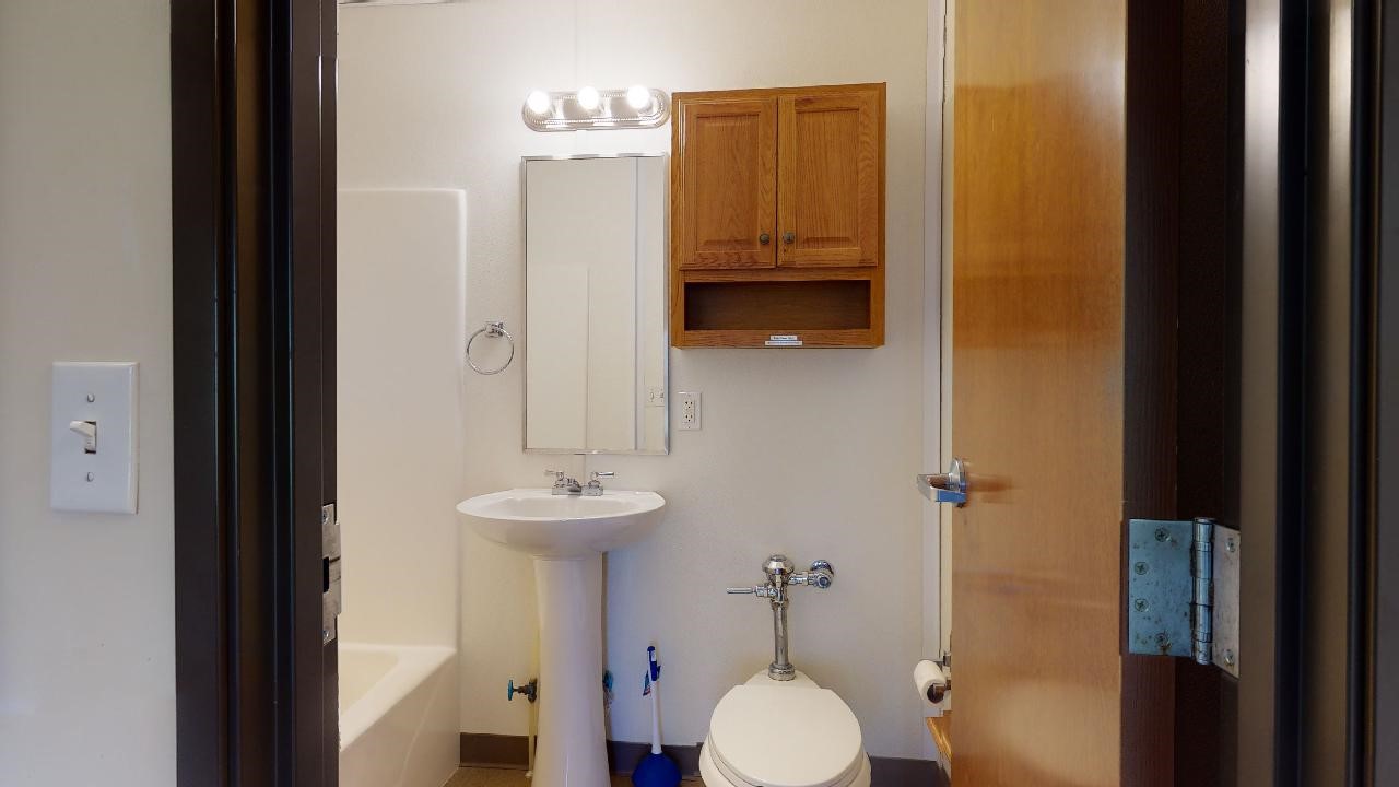 5585 Straub Road College Station, TX 77845 - Photo 32 of 50 a bathroom with a sink and a mirror