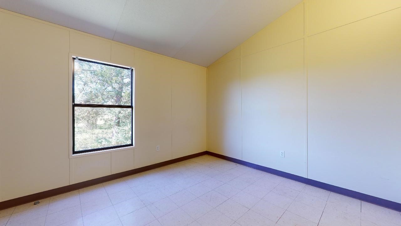 5585 Straub Road College Station, TX 77845 - Photo 36 of 50 an empty room with windows