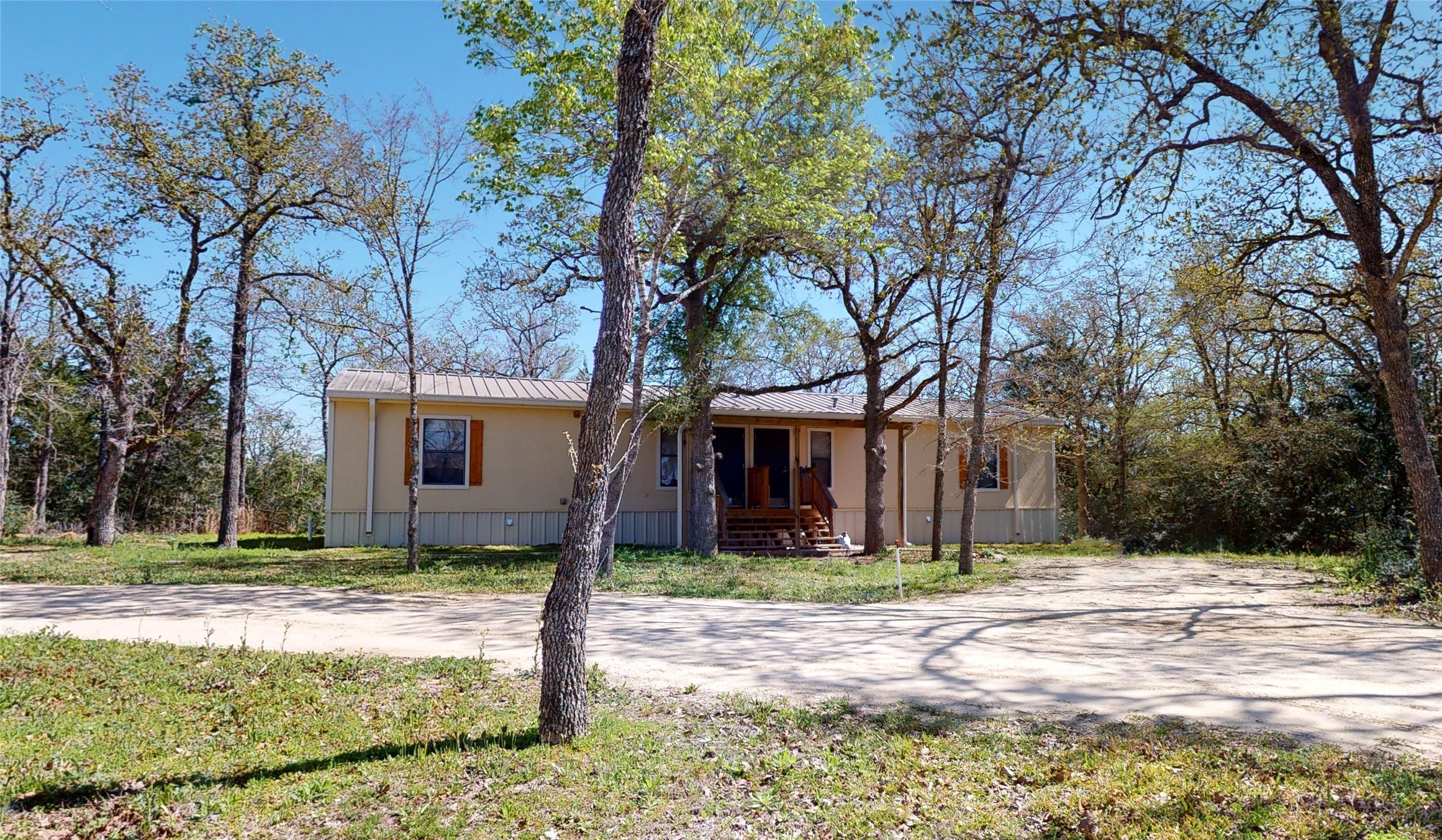 5585 Straub Road College Station, TX 77845 - Photo 44 of 50 a tree in front of a white house