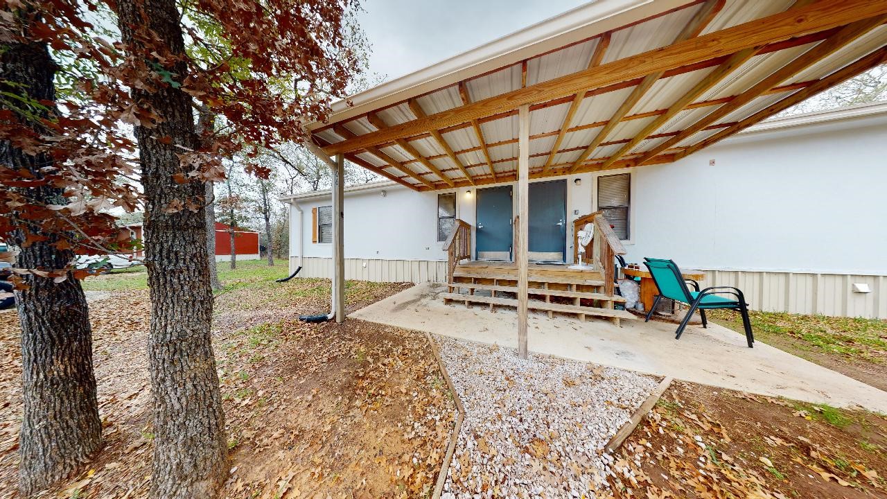 5585 Straub Road College Station, TX 77845 - Photo 49 of 50 a view of a room with wooden walls and stairs