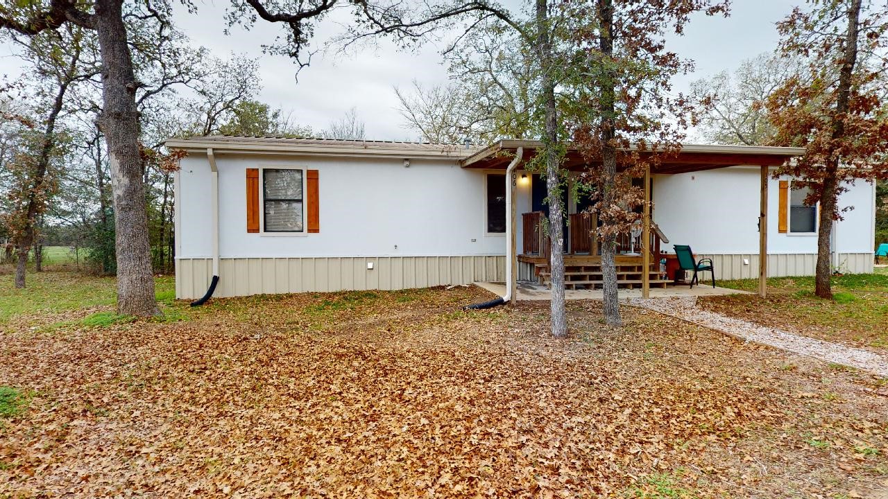5585 Straub Road College Station, TX 77845 - Photo 50 of 50 a house with a tree in the background