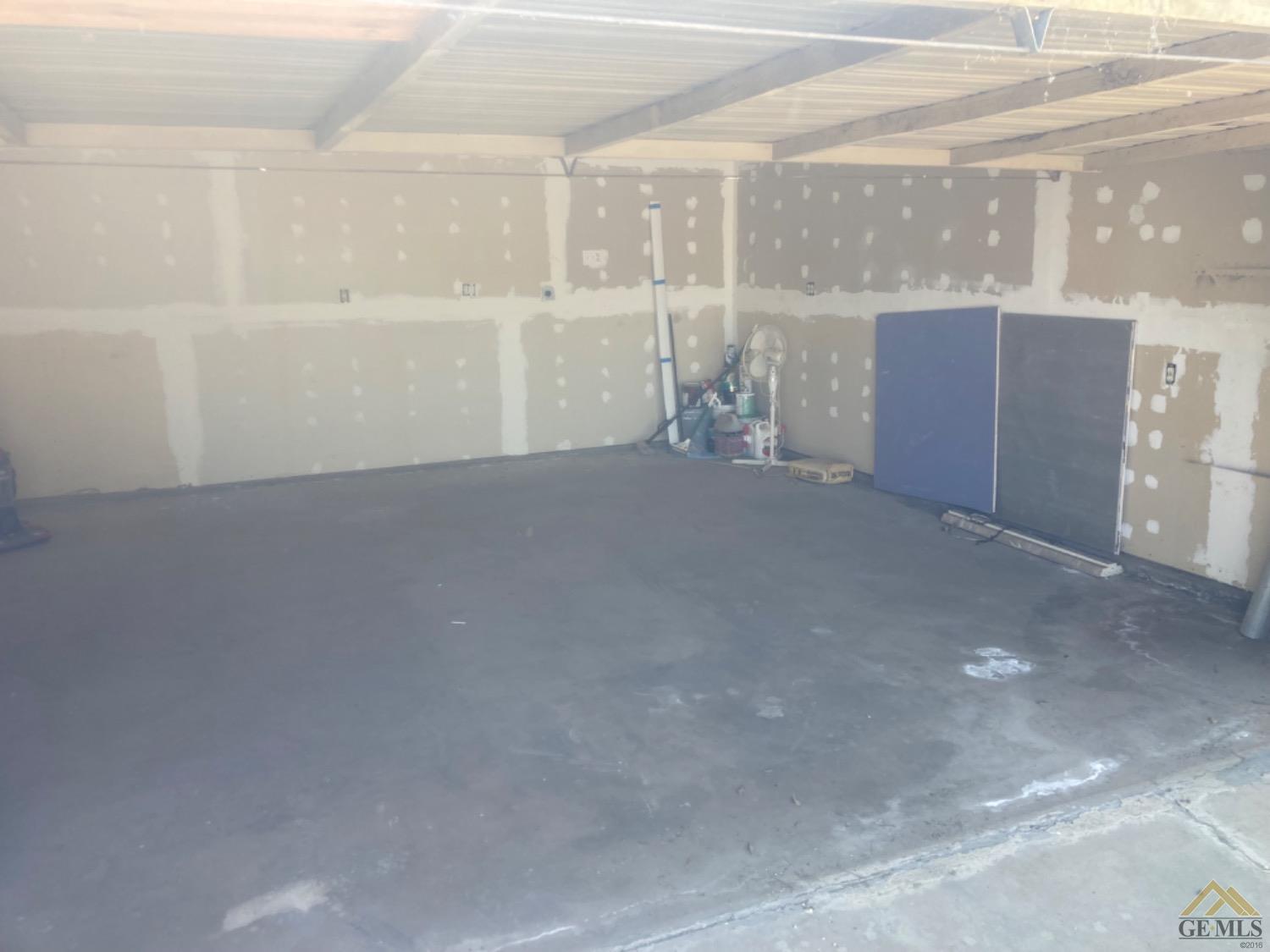 Undisclosed Address Buttonwillow, CA 93206 - Photo 13 of 56 a view of an empty room with a window