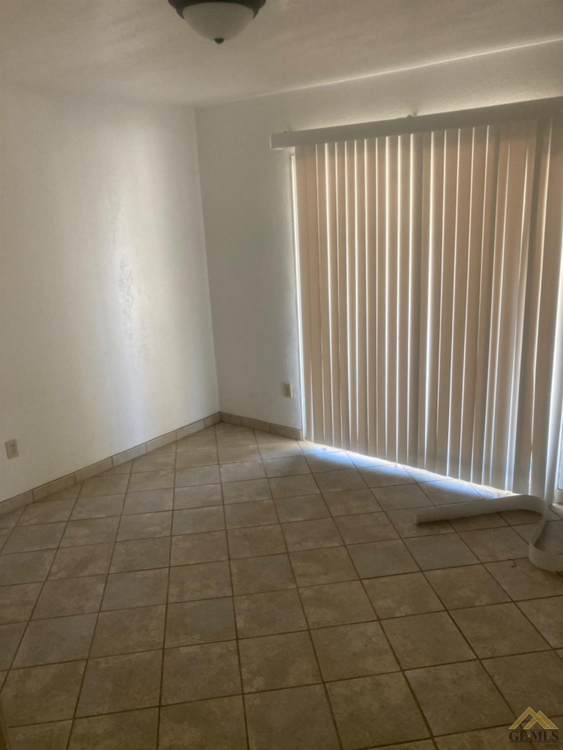 Undisclosed Address Buttonwillow, CA 93206 - Photo 24 of 56 a view of an empty room and window