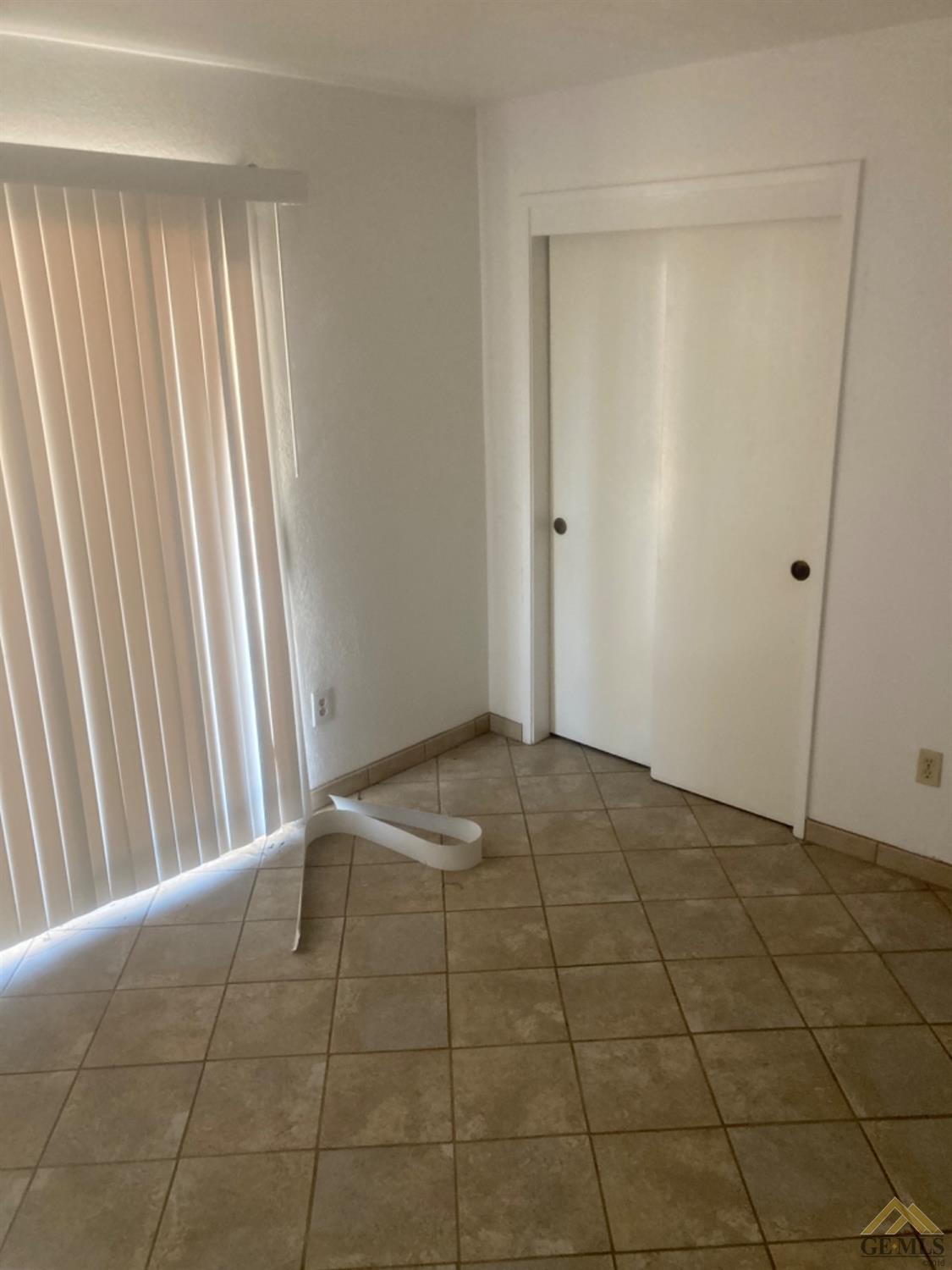 Undisclosed Address Buttonwillow, CA 93206 - Photo 25 of 56 a view of an empty room and window