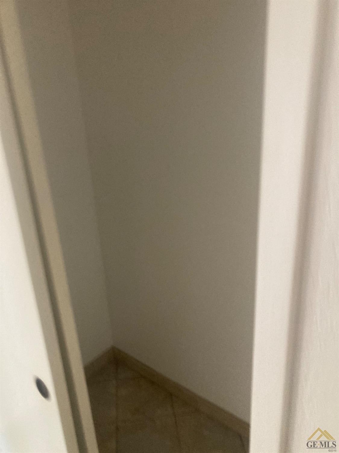 Undisclosed Address Buttonwillow, CA 93206 - Photo 27 of 56 close up of a white marble wall