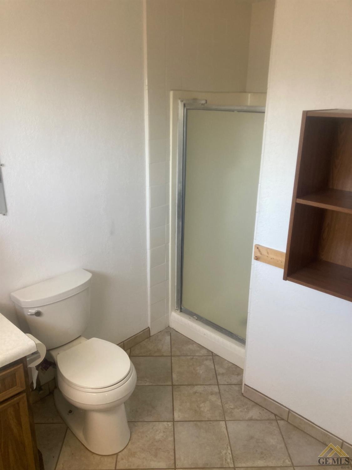 Undisclosed Address Buttonwillow, CA 93206 - Photo 32 of 56 a bathroom with a toilet