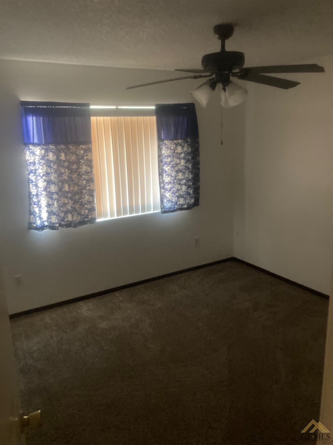 Undisclosed Address Buttonwillow, CA 93206 - Photo 35 of 56 a view of an empty room and a window