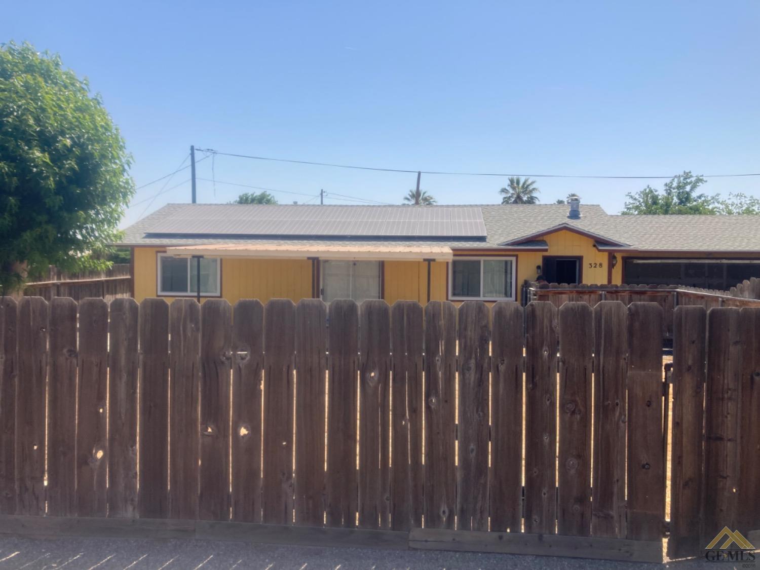 Undisclosed Address Buttonwillow, CA 93206 - Photo 47 of 56 a view of a house with wooden fence