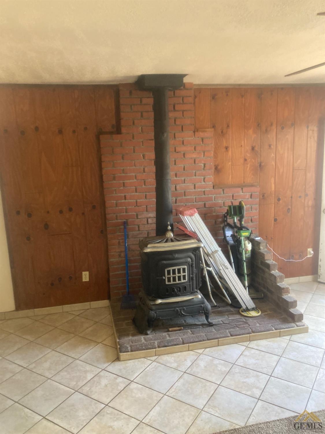 Undisclosed Address Buttonwillow, CA 93206 - Photo 9 of 56 a view of a wooden door with a bench