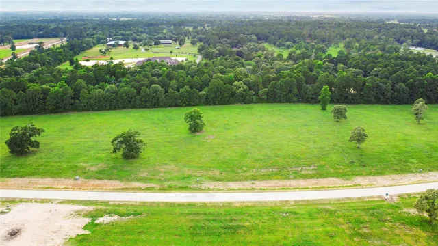 a view of a golf course with a lake