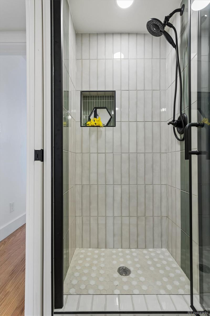 2293 Fenton Street Edgewater, CO 80214 - Photo 10 of 18 a bathroom with a shower