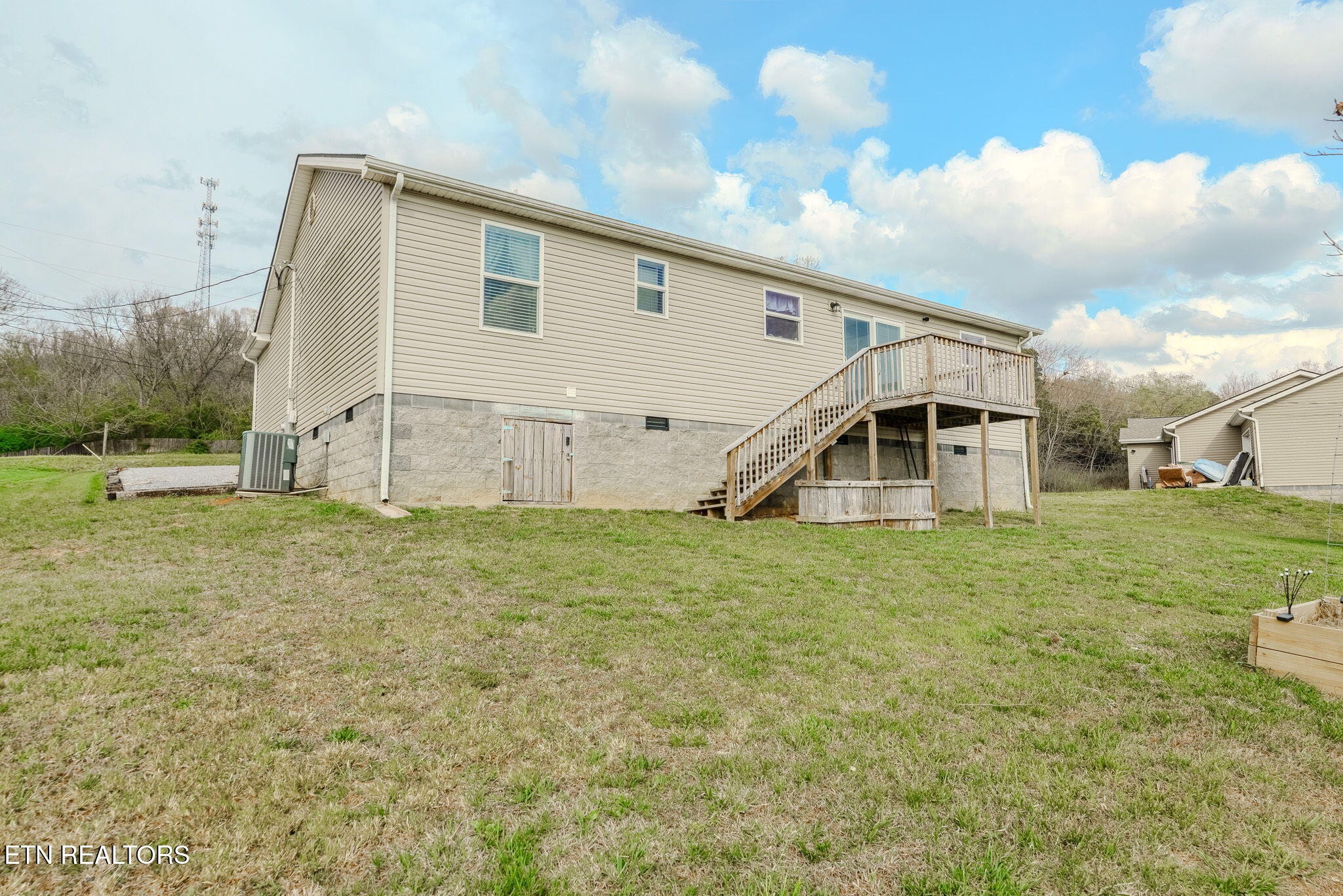 3215 Smith Road White Pine, TN 37890 - Photo 23 of 28 a view of a house with a yard