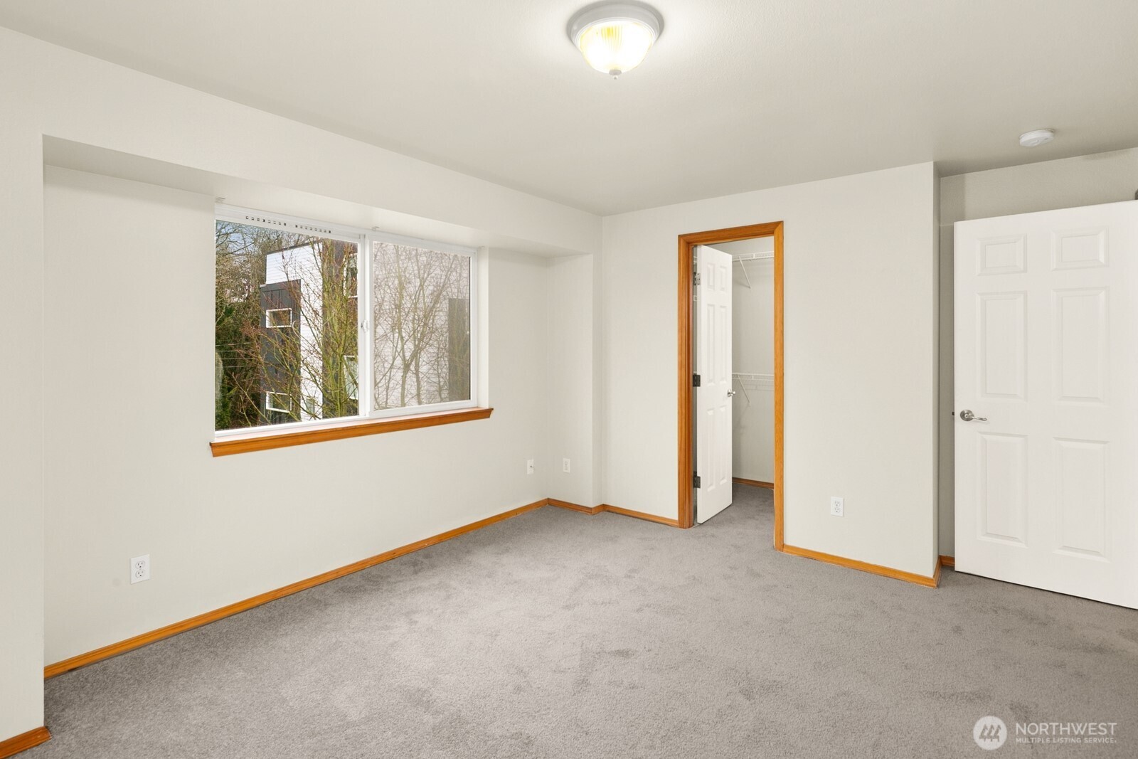 1417 North 97th Street Seattle, WA 98103 - Photo 13 of 23 an empty room with windows