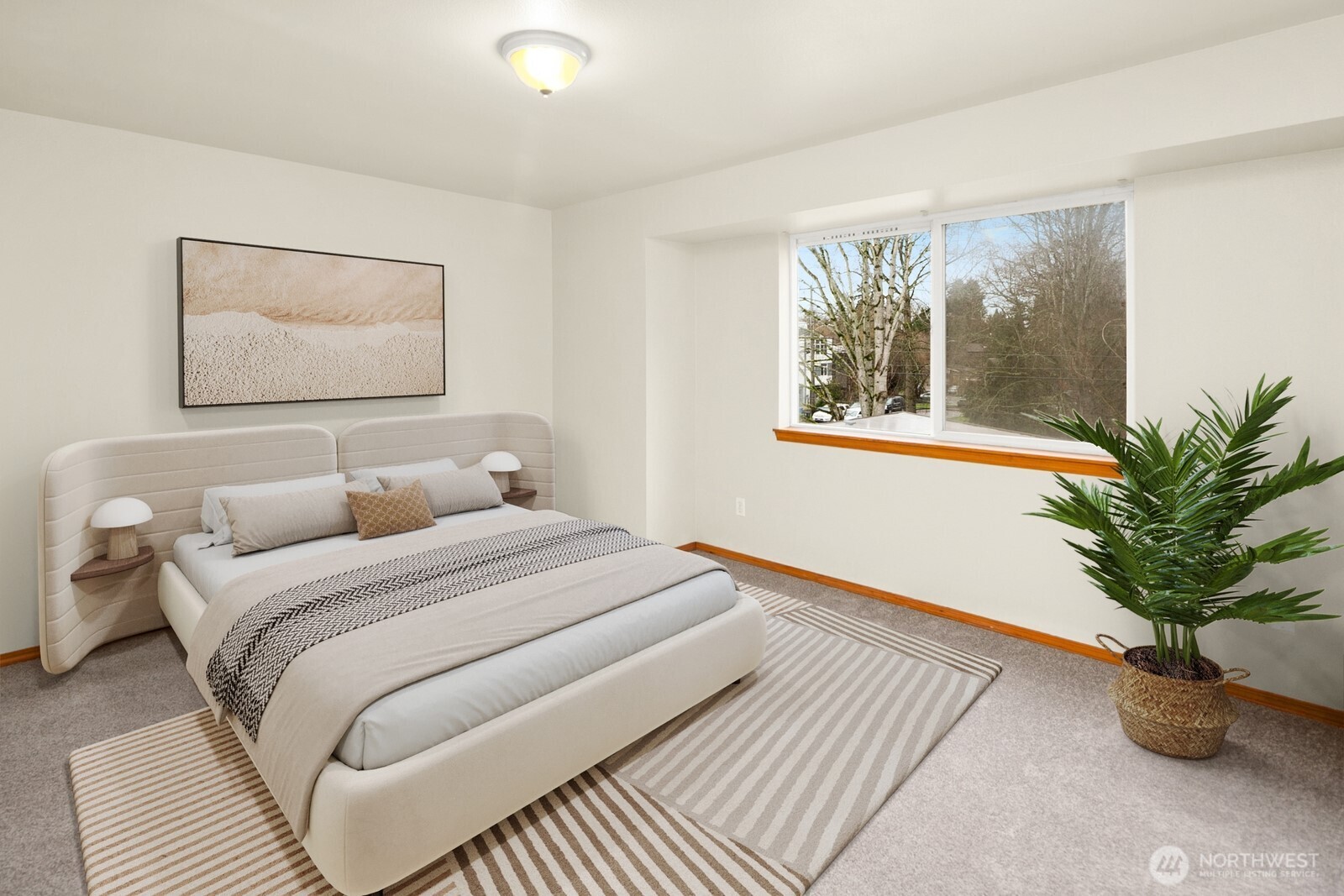 1417 North 97th Street Seattle, WA 98103 - Photo 14 of 23 a bedroom with bed and window