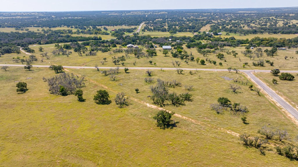 Lot 100 Packsaddle Drive Harper, TX 78631 - Photo 26 of 32 an aerial view of ocean residential houses with outdoor space