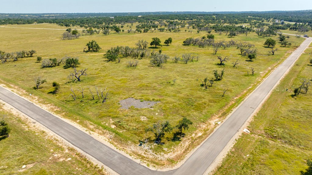 Lot 100 Packsaddle Drive Harper, TX 78631 - Photo 4 of 32 a view of an ocean from a balcony