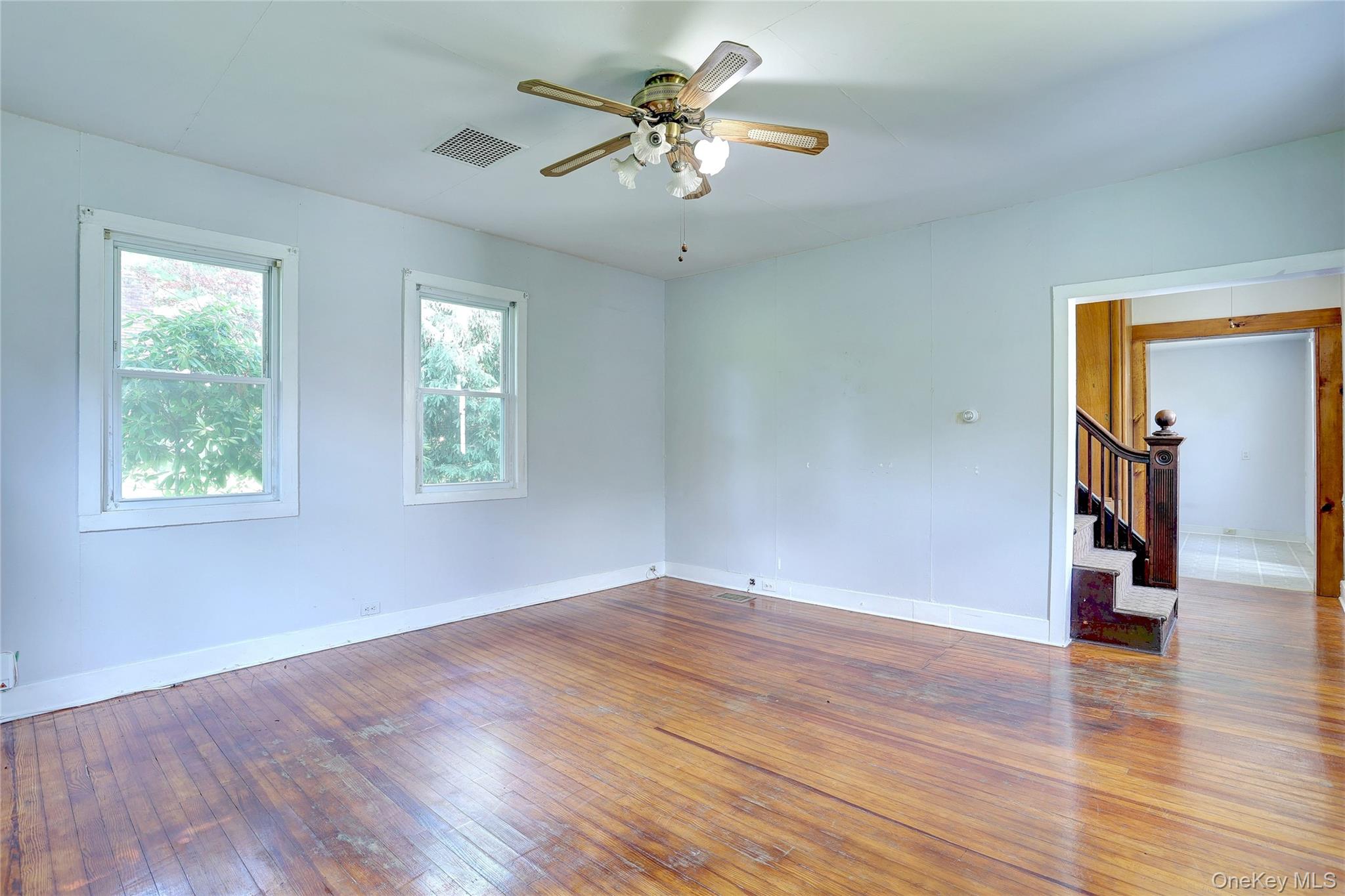 500 Haverstraw Road Suffern, NY 10901 - Photo 19 of 36 a view of empty room with wooden floor and fan