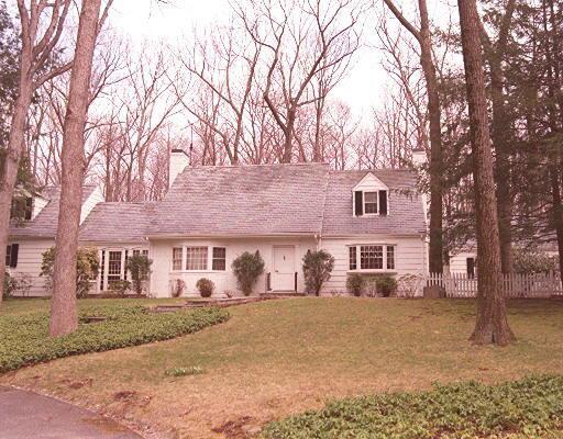1649 High Ridge Road Stamford, CT 06903 - Photo 1 of 1 a front view of a house with large trees